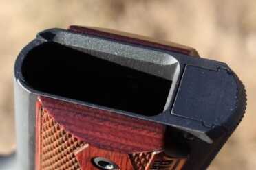 Two New 9mm Springfield Range Officers The mag well on the Operator. The bevel is small, but helps with mag changes.