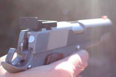 Two New 9mm Springfield Range Officers The stainless RO has more propensity for glare, but it looks more flashy, too.