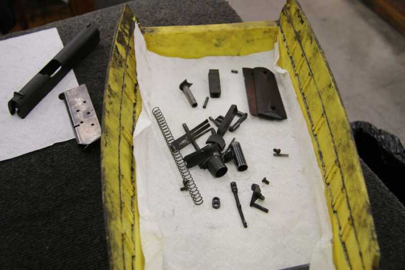 Turnbull breaks the guns all the way down to judge the condition of all of the parts.