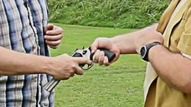 This will stop a revolver, but only long enough for your assailant to break your finger. 