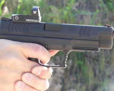 First Look! Springfield Armory XDM Optical Sight 9mm Pistol (OSP). Full Review. The optic sits nice and low, but it does not allow a co-witness with the open sights, for those dying to ask.