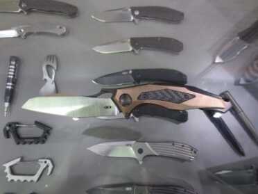 Zero Tolerance's Futuristic LE 0427 -- Blade Show 2016 On the glass, above some other impressive ZT models.
