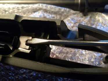 Back to the Basics: Swapping My Tupperware Rifle Stock for a Bell and Carlson Instead of prying the clip upwards, I twisted the screwdriver. This seemed to work better.