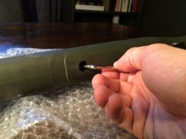 Back to the Basics: Swapping My Tupperware Rifle Stock for a Bell and Carlson Beginning the disessembly.