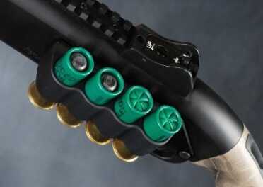 The shotgun is equipped with a four-round "sidesaddle" for carrying spare ammo within quick reach.
