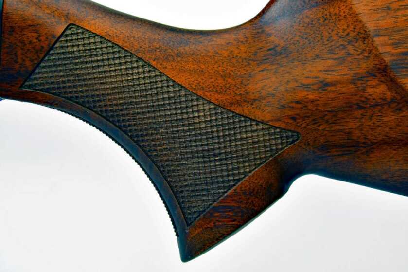 High-Grade Upgrade: Benelli's Lupo Rifle Gets a Beautiful Walnut Stock Benelli Lupo BE.S.T. Walnut rifle, fine checkering on stock
