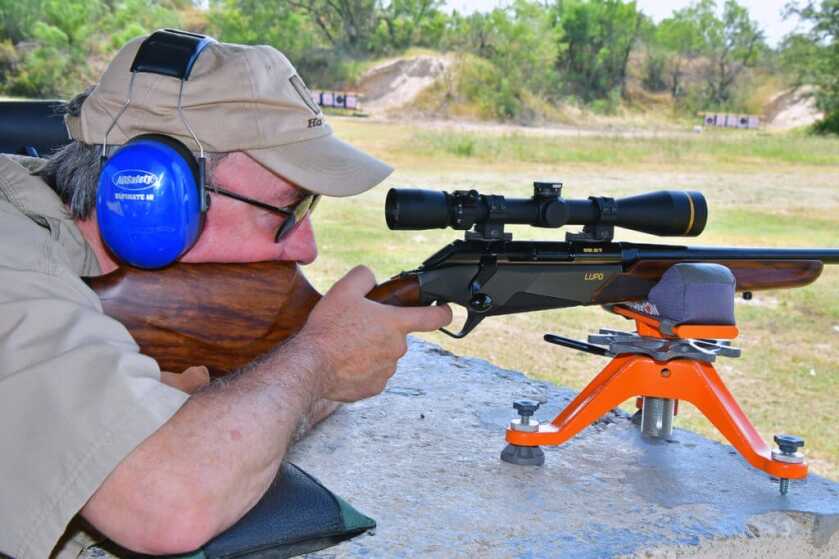 High-Grade Upgrade: Benelli's Lupo Rifle Gets a Beautiful Walnut Stock The author testing the Benelli Lupo BE.S.T. Walnut rifle, 6.5 Creedmoor