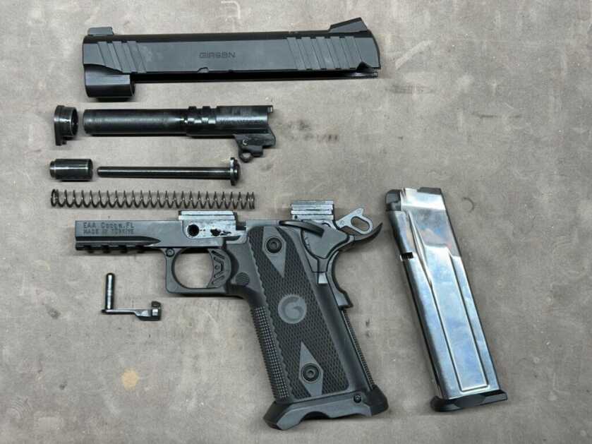 The Girsan Witness2311 is disassembled on a cleaning mat.