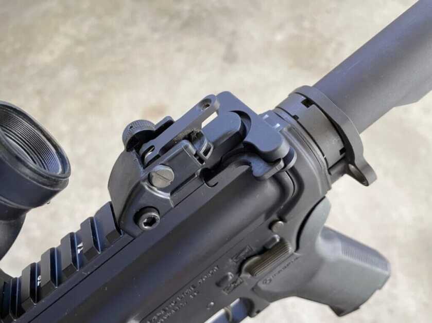 mil-spec charging handle and BUIS rear sight
