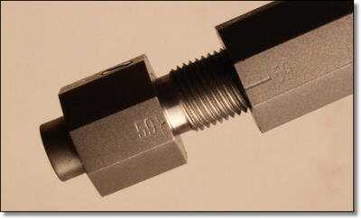 The breechplug removes with a standard Allen wrench that comes with the gun, and to re-install it, you have to start with the lines on the side lined up.