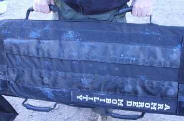 shieldpic The Armored Mobility Inc. Shield is 22 pounds and will stop multiple hits from just about any small arms cartridge point blank.