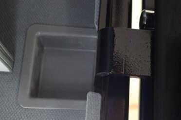 Even on the backside of the door, an active bolt (just above this hinge) will help to secure a safe. Some safes have fixed posts on the back side of the door which cuts costs, but compromises security.