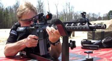 The open sights co-witnessed perfectly with the Aimpoint PRO.