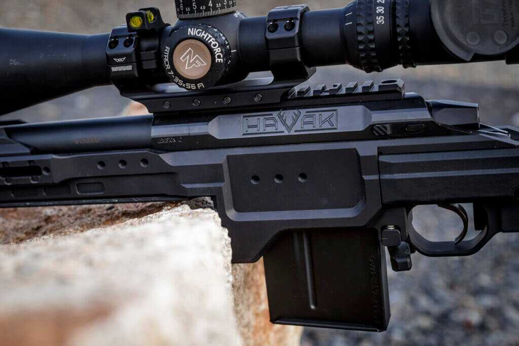 Kinetic Research Group C-4 Chassis Magazine well with Seekins HAVAK Action and Accurate Mag 10-round magazine and Nightforce ATACR 7-35x56mm riflescope in Warne Skyline one piece mount with Warne Vapor lightweight scope level