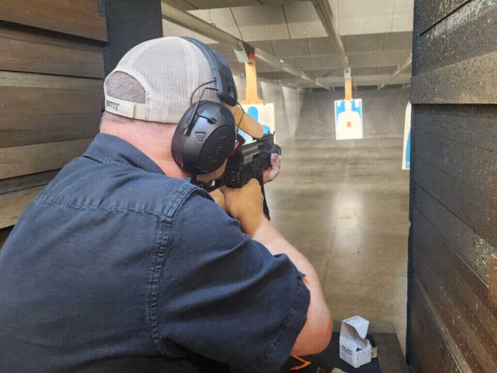 man shootting at the gun school range