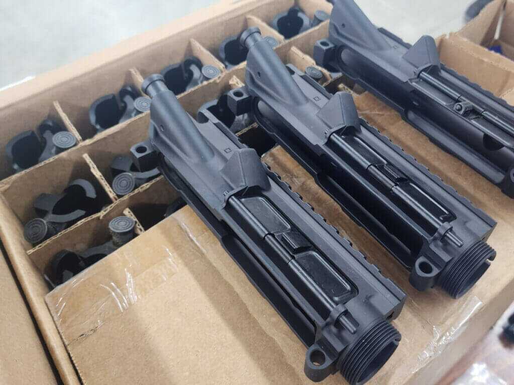 AR parts in boxes