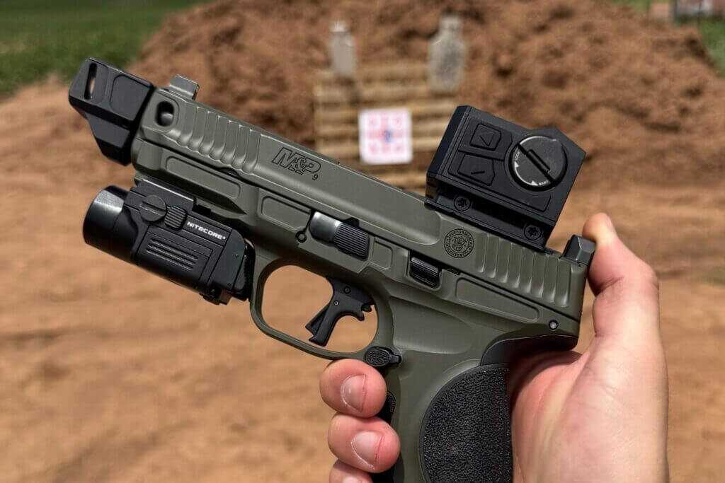 man holding pistol. FMP13