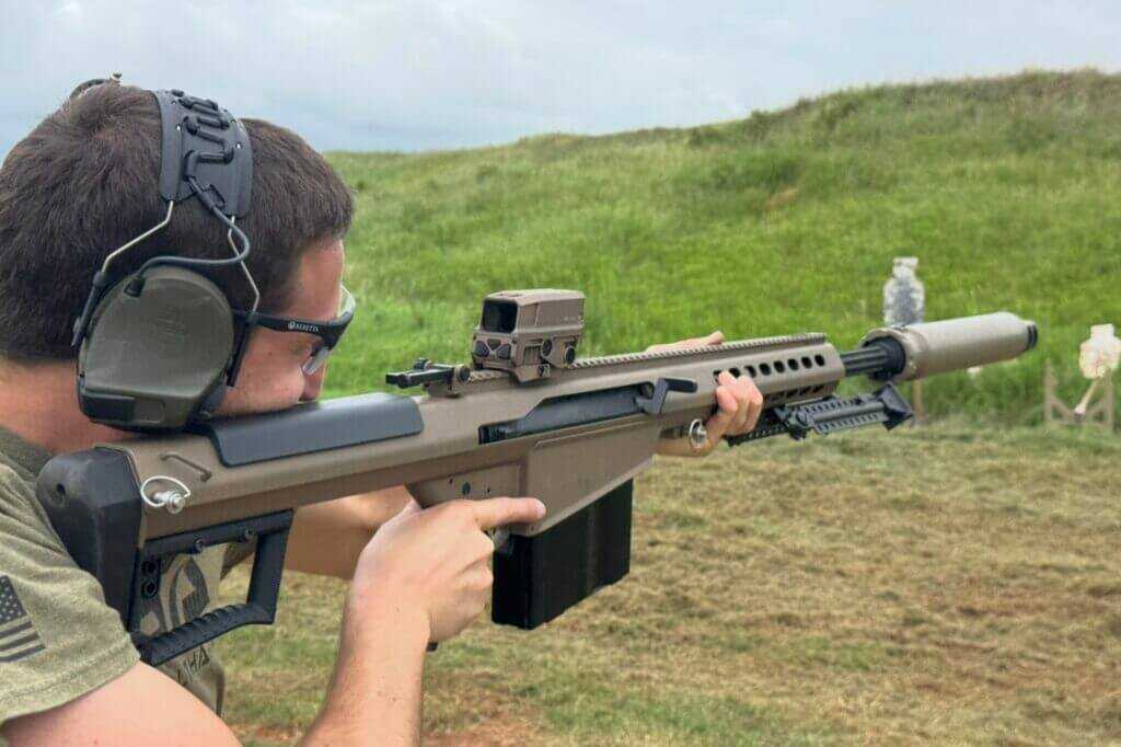 ComTac VIII 3M PELTOR headset left cup showing boom microphone and slim cup design for rifle cheek weld