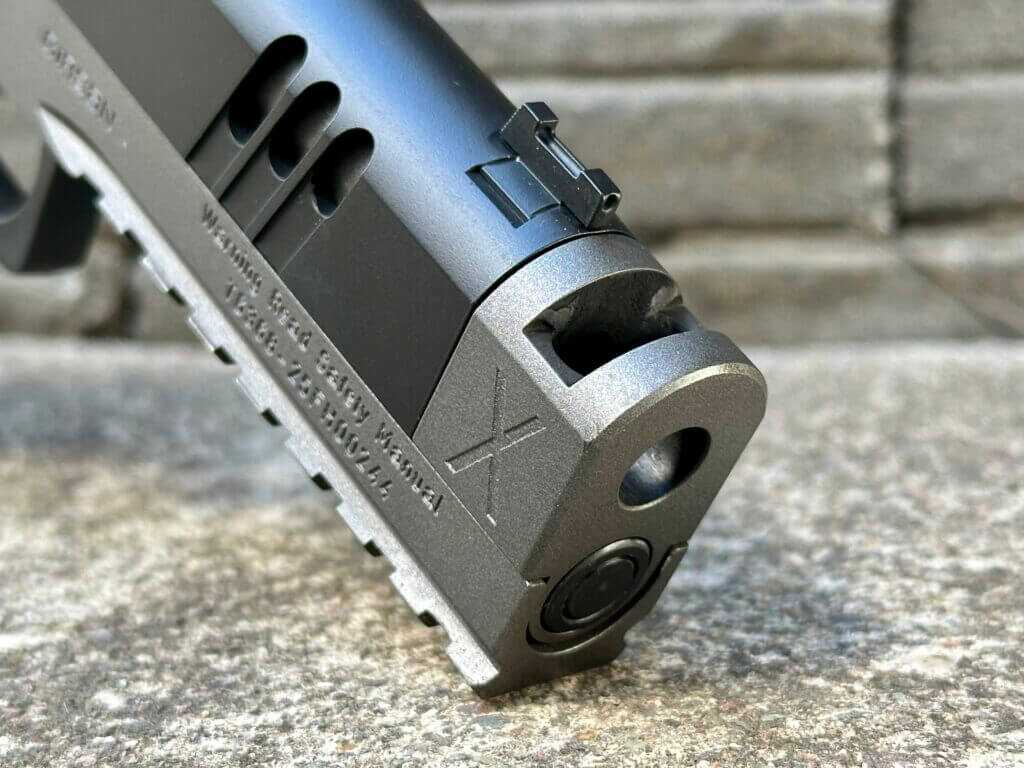 Close up of the muzzle of a compensated pistol. Witness2311 Match X