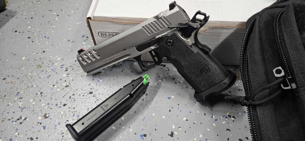 Left side profile of Bersa M2XI 9mm 2011 showing tapering slide, front and rear serrations