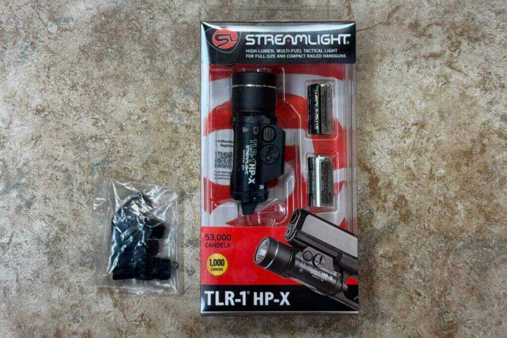 TLR-1 HP-X with rail keys paddles and CR123A batteries on table