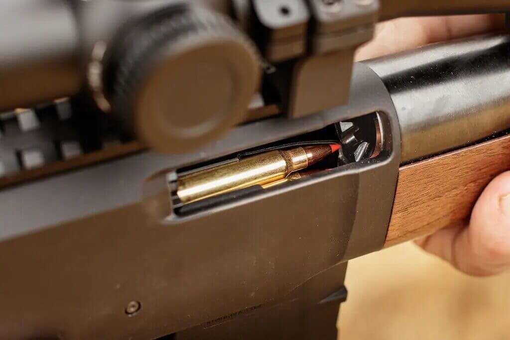 223 cartridge feeding from AR-15 magazine in the Henry Lever Action Supreme ejection port