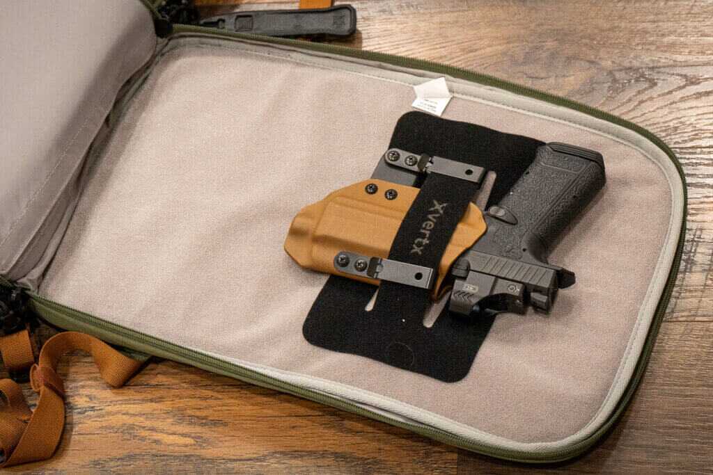 Vertx Gamut 32L hidden Velcro sleeve for ballistic panel at bottom of CCW compartment