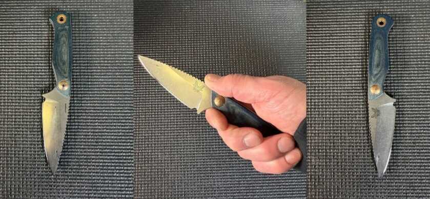 Benchmade Dacian fixed blade in hand showing MagnaCut full tang and Micarta grip