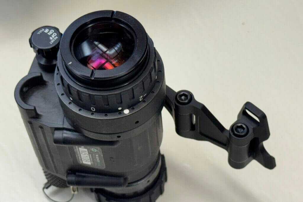 Dual pivot screws on MAX14 used to adjust friction for eye swap and stow control