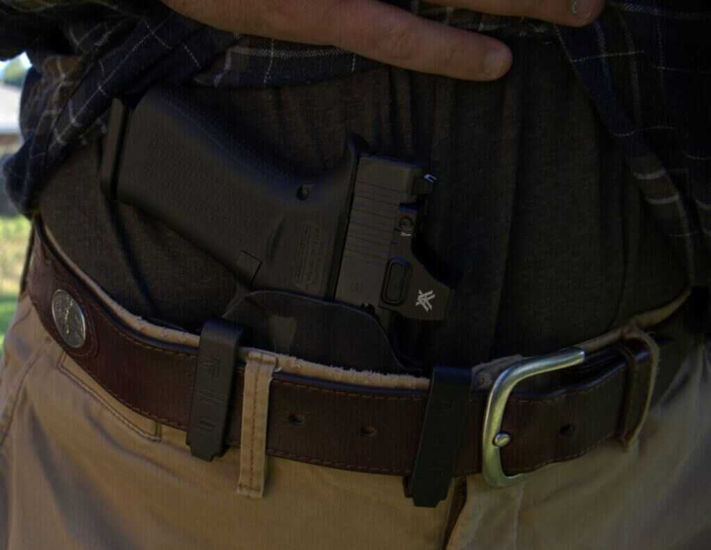 Safariland IncogX exposed at the beltline with a clear firing grip for the draw