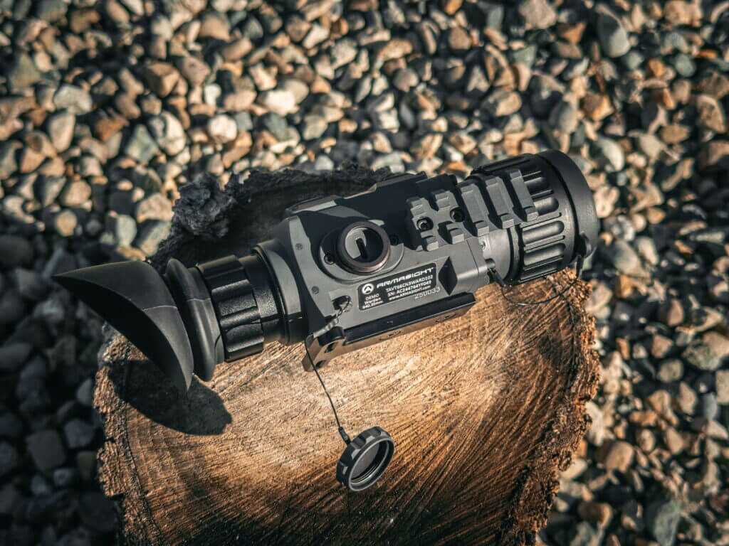 Armasight Warden 640 USB C port and tethered caps shown on bench