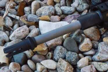 The barrel has a flat matte finish that holds oil well and won’t reflect light.