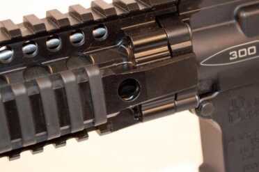 Blackout is the new Black—Daniel Defense DDM4v5 Review Quick Detach holes are on both sides of the DDM4 rail, front and back.