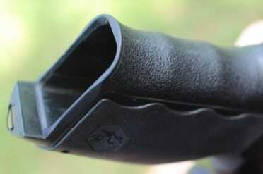 The mag well has a slight bevel. For a compact, this is sufficient.  