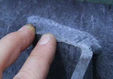 If you have any doubt that splatter is dangerous, this steel part's edge was damaged from the swinger splatter.  