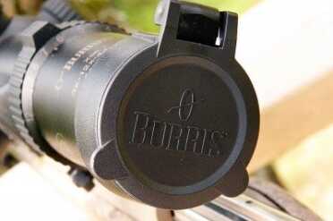 Flip-up lens caps are standard for both the objective and ocular lenses.