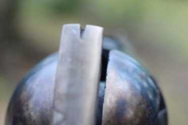 The Original Hand Cannon--no FFL required The rear sight is simply ground into the hammer. No adjustments.