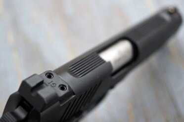 The serrations cut the glare and can be used as a guide for point shooting.