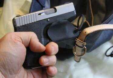 This trigger clip shield is not the model for the Kahr, but you get the point. The included lanyard ties into your bag. 