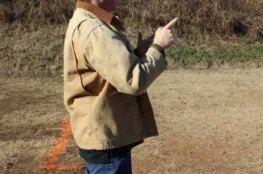 Hands in the ready position provide something for the bad guy to look at. 