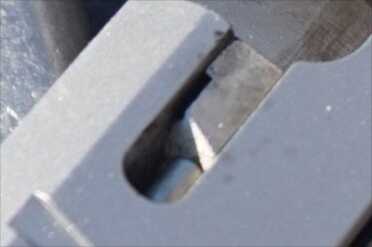 The external extractor is fat and stubby. It isn't prone to sheering off like some lighter .380 extractors.