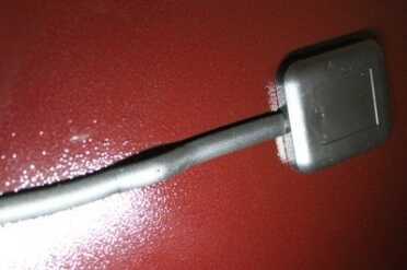     The Antenna in place on the side of the safe. No 100% attractive, but worth it.