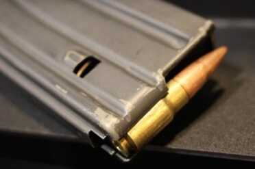 Single stacked a standard AR mag will hold 10 rounds of .416 Hushpuppy.