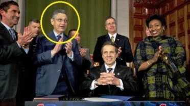 Silver at the signing of the SAFE Act.  (Photo: AP)