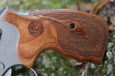 Smith & Wesson Snubby .357 Revolver - Performance Center 686--Review The wooden grips on the 686 look good and offer excellent grip.