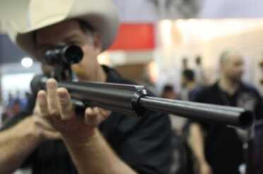 .45 Cal/800fps Air Gun Protects Your Nuts - AirForce Rifles - SHOT Show 2015 A Texan with a Texan.