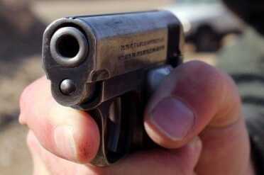 The front of the trigger guard is a good place to rest your finger. 