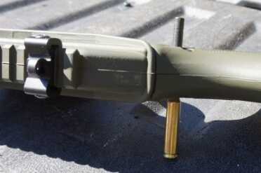 To get the stock to fold, simply pop a pin.