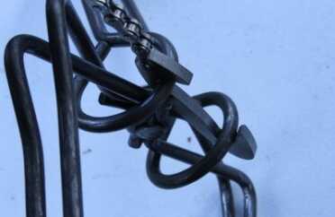 Once you figure out how to anchor the trap with your foot and yank up on the T handle, the tool clips the mainspring.