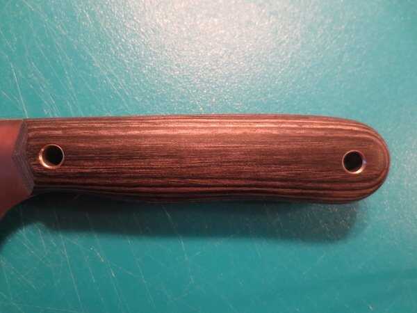 The Most Under-Appreciated Tool You Should Invest Money In, But Probably Haven't A look at the diamond wood handle on the Santoku.